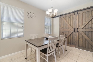 Welcome to this charming 3-bedroom, 2.5-bath home located in the on Harmony Golf Preserve in Florida - for sale on GolfHomes.com, golf home, golf lot