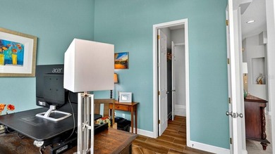 Perfectly positioned on the 12th tee of the south golf course in on Plantation Bay Golf and Country Club in Florida - for sale on GolfHomes.com, golf home, golf lot