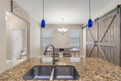 Welcome to this charming 3-bedroom, 2.5-bath home located in the on Harmony Golf Preserve in Florida - for sale on GolfHomes.com, golf home, golf lot