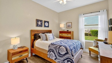 Perfectly positioned on the 12th tee of the south golf course in on Plantation Bay Golf and Country Club in Florida - for sale on GolfHomes.com, golf home, golf lot