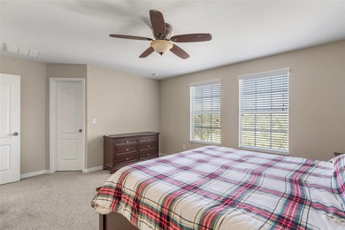 Welcome to this charming 3-bedroom, 2.5-bath home located in the on Harmony Golf Preserve in Florida - for sale on GolfHomes.com, golf home, golf lot