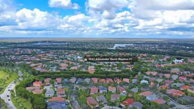Discover the perfect combination of comfort, style, and on Weston Hills Country Club in Florida - for sale on GolfHomes.com, golf home, golf lot