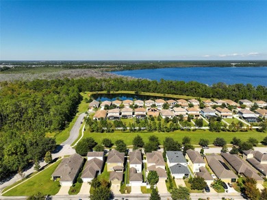 Welcome to this charming 3-bedroom, 2.5-bath home located in the on Harmony Golf Preserve in Florida - for sale on GolfHomes.com, golf home, golf lot