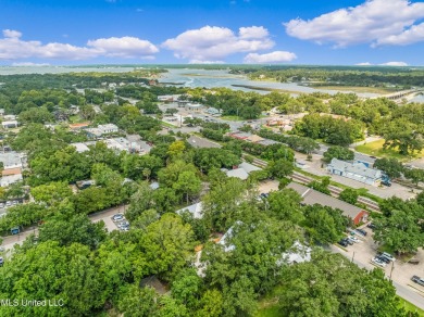 Welcome to 1110 Robinson St, a stunning home nestled in the on Gulf Hills Golf Club in Mississippi - for sale on GolfHomes.com, golf home, golf lot