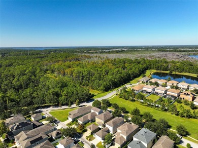 Welcome to this charming 3-bedroom, 2.5-bath home located in the on Harmony Golf Preserve in Florida - for sale on GolfHomes.com, golf home, golf lot