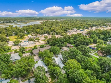 Welcome to 1110 Robinson St, a stunning home nestled in the on Gulf Hills Golf Club in Mississippi - for sale on GolfHomes.com, golf home, golf lot