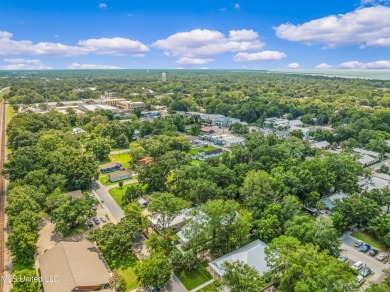 Welcome to 1110 Robinson St, a stunning home nestled in the on Gulf Hills Golf Club in Mississippi - for sale on GolfHomes.com, golf home, golf lot