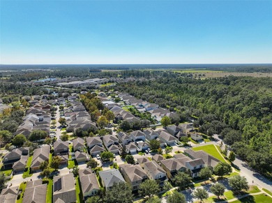 Welcome to this charming 3-bedroom, 2.5-bath home located in the on Harmony Golf Preserve in Florida - for sale on GolfHomes.com, golf home, golf lot