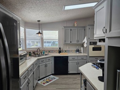 Located in Cypress Lakes Village in a 55+ resort style MH on Big Cypress Golf and Country Club in Florida - for sale on GolfHomes.com, golf home, golf lot