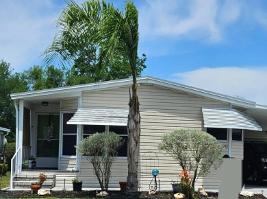 Located in Cypress Lakes Village in a 55+ resort style MH on Big Cypress Golf and Country Club in Florida - for sale on GolfHomes.com, golf home, golf lot
