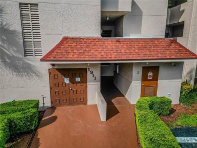 Welcome to 1911 Sabal Palm Dr #105--your serene escape with on Pine Island Ridge Country Club in Florida - for sale on GolfHomes.com, golf home, golf lot