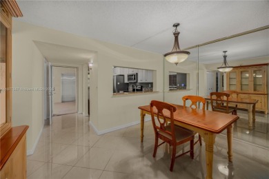 Welcome to 1911 Sabal Palm Dr #105--your serene escape with on Pine Island Ridge Country Club in Florida - for sale on GolfHomes.com, golf home, golf lot