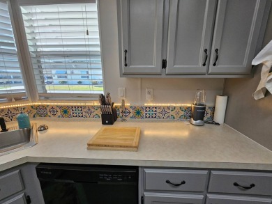 Located in Cypress Lakes Village in a 55+ resort style MH on Big Cypress Golf and Country Club in Florida - for sale on GolfHomes.com, golf home, golf lot