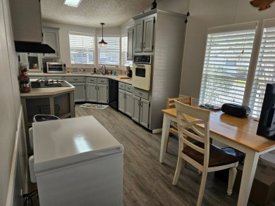 Located in Cypress Lakes Village in a 55+ resort style MH on Big Cypress Golf and Country Club in Florida - for sale on GolfHomes.com, golf home, golf lot