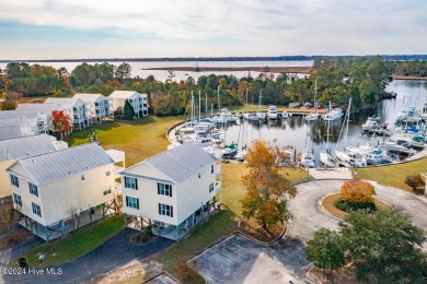 STUNNING LOCATION! Beautiful townhouse overlooking the Northwest on Harbour Point Golf Club in North Carolina - for sale on GolfHomes.com, golf home, golf lot