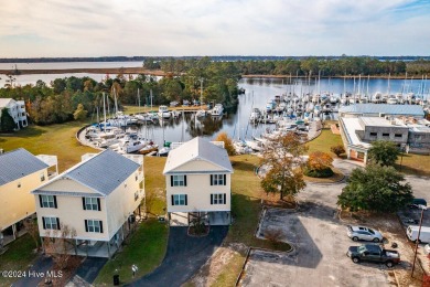 STUNNING LOCATION! Beautiful townhouse overlooking the Northwest on Harbour Point Golf Club in North Carolina - for sale on GolfHomes.com, golf home, golf lot