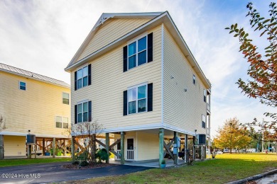 STUNNING LOCATION! Beautiful townhouse overlooking the Northwest on Harbour Point Golf Club in North Carolina - for sale on GolfHomes.com, golf home, golf lot