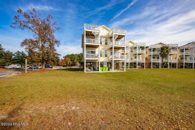 STUNNING LOCATION! Beautiful townhouse overlooking the Northwest on Harbour Point Golf Club in North Carolina - for sale on GolfHomes.com, golf home, golf lot