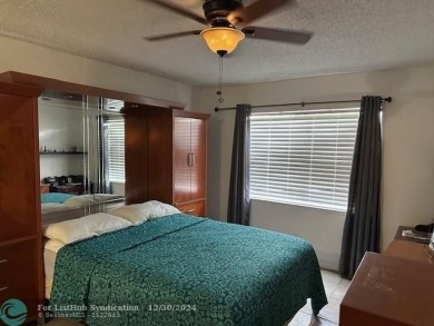 Beautiful water view updated 1 bedroom, 1  1/2  bath condo on Sunrise Lakes Phase III in Florida - for sale on GolfHomes.com, golf home, golf lot
