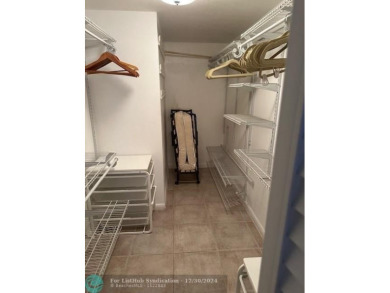 Beautiful water view updated 1 bedroom, 1  1/2  bath condo on Sunrise Lakes Phase III in Florida - for sale on GolfHomes.com, golf home, golf lot
