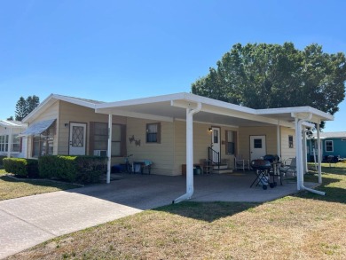 Welcome to this beautifully maintained 2/2 home where you will on Lake Henry Golf Club in Florida - for sale on GolfHomes.com, golf home, golf lot