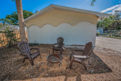 Amazing Dunedin location!! This 3 bedroom/1.5 bath/2 car garage on The Dunedin Country Club in Florida - for sale on GolfHomes.com, golf home, golf lot