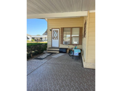 Welcome to this beautifully maintained 2/2 home where you will on Lake Henry Golf Club in Florida - for sale on GolfHomes.com, golf home, golf lot