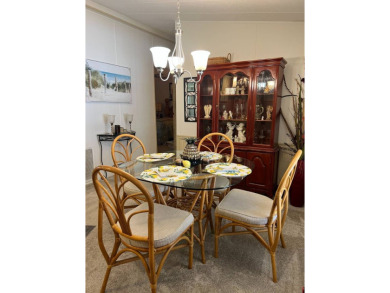 Welcome to this beautifully maintained 2/2 home where you will on Lake Henry Golf Club in Florida - for sale on GolfHomes.com, golf home, golf lot