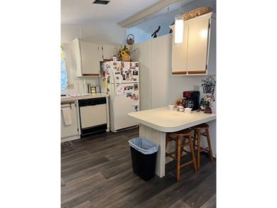Welcome to this beautifully maintained 2/2 home where you will on Lake Henry Golf Club in Florida - for sale on GolfHomes.com, golf home, golf lot