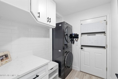 Fully RENOVATED 3-bed, 2.5-bath END-UNIT townhome with 2-car on The Yard in Florida - for sale on GolfHomes.com, golf home, golf lot