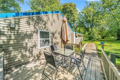 Welcome to this fully renovated 3-bedroom, 2-bath smart home on Village Green Golf Course in Ohio - for sale on GolfHomes.com, golf home, golf lot