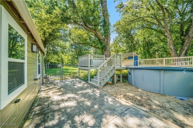 Welcome to this fully renovated 3-bedroom, 2-bath smart home on Village Green Golf Course in Ohio - for sale on GolfHomes.com, golf home, golf lot