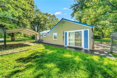 Welcome to this fully renovated 3-bedroom, 2-bath smart home on Village Green Golf Course in Ohio - for sale on GolfHomes.com, golf home, golf lot