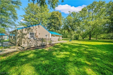 Welcome to this fully renovated 3-bedroom, 2-bath smart home on Village Green Golf Course in Ohio - for sale on GolfHomes.com, golf home, golf lot