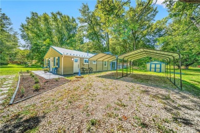 Welcome to this fully renovated 3-bedroom, 2-bath smart home on Village Green Golf Course in Ohio - for sale on GolfHomes.com, golf home, golf lot