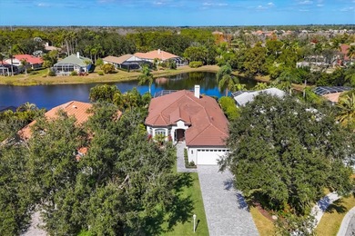 Welcome to an exceptional residence in the heart of University on University Park Country Club in Florida - for sale on GolfHomes.com, golf home, golf lot