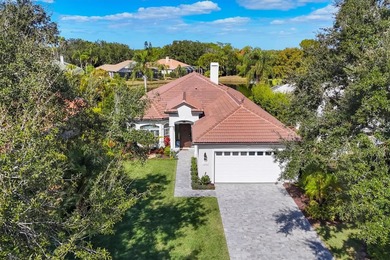 Welcome to an exceptional residence in the heart of University on University Park Country Club in Florida - for sale on GolfHomes.com, golf home, golf lot