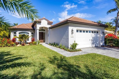 Welcome to an exceptional residence in the heart of University on University Park Country Club in Florida - for sale on GolfHomes.com, golf home, golf lot