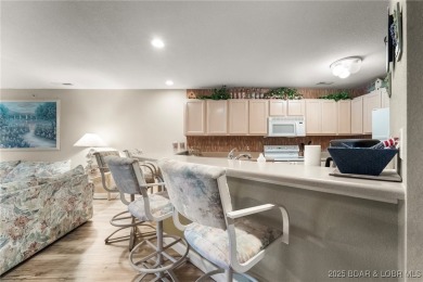 Walk in level lakefront ease in Sought-After Bristol Bay!  Don't on Seasons Ridge At Four Seasons in Missouri - for sale on GolfHomes.com, golf home, golf lot