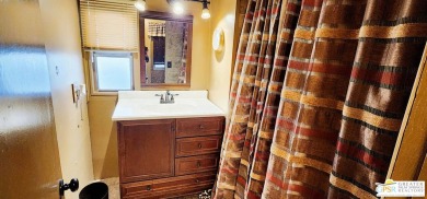 Discover an affordable gem in Desert Crest Country Club! This on Desert Crest Country Club in California - for sale on GolfHomes.com, golf home, golf lot