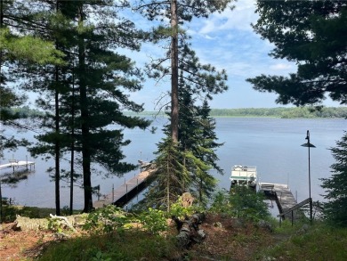 Step back in time with this charming, 100+ year-old seasonal log on Minnesota National Golf Course in Minnesota - for sale on GolfHomes.com, golf home, golf lot