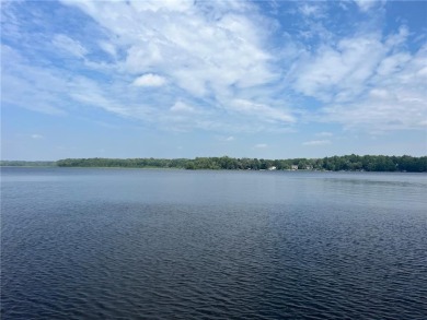Step back in time with this charming, 100+ year-old seasonal log on Minnesota National Golf Course in Minnesota - for sale on GolfHomes.com, golf home, golf lot