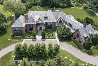 The current owners purchased this magnificent English Country on Indian Hill Club in Illinois - for sale on GolfHomes.com, golf home, golf lot