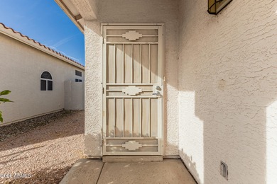Live on the 18th green of Coyote Lakes in this bright, inviting on Coyote Lakes Golf Club in Arizona - for sale on GolfHomes.com, golf home, golf lot