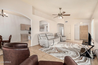 Live on the 18th green of Coyote Lakes in this bright, inviting on Coyote Lakes Golf Club in Arizona - for sale on GolfHomes.com, golf home, golf lot