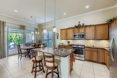 BEST PRICED Briscoe Floorplan with 2-bedrooms, a study and 2.5 on Wildhorse Golf Club of Robson Ranch in Texas - for sale on GolfHomes.com, golf home, golf lot