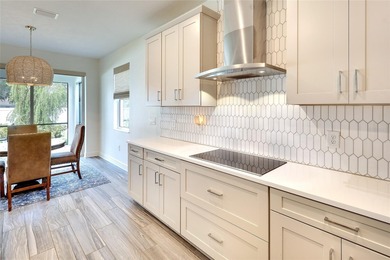 Nestled within the sought after golf course gated community of on River Wilderness Golf and Country Club in Florida - for sale on GolfHomes.com, golf home, golf lot