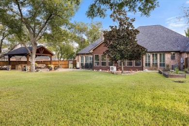 Nestled on 1.12 acres, this home in the highly sought-after on Nutcracker Golf Club in Texas - for sale on GolfHomes.com, golf home, golf lot