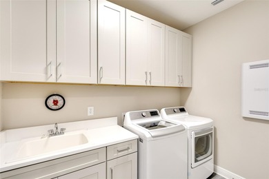 Nestled within the sought after golf course gated community of on River Wilderness Golf and Country Club in Florida - for sale on GolfHomes.com, golf home, golf lot