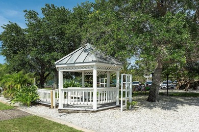 Nestled within the sought after golf course gated community of on River Wilderness Golf and Country Club in Florida - for sale on GolfHomes.com, golf home, golf lot